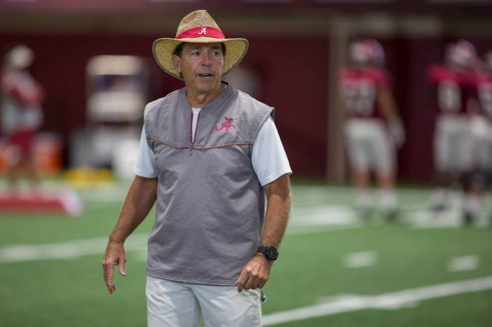 Nick Saban wearing a hat that was cursed by a witch